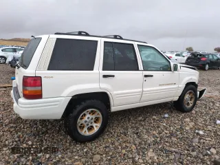 1996 Jeep Grand Cherokee Limited with VIN 1J4GZ78Y0TC185669, listed as a Copart auction lot 79032274 with 184,929 mi miles and Salvage Title. Bid and sale history available at carsss.com. Image 3.
