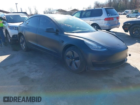 2020 Tesla Model 3 Standard Range Plus with VIN 5YJ3E1EA4LF745491, listed as a IAAI auction lot 41186726 with 74,575 mi miles and . Bid and sale history available at DreamBid. Image 1.