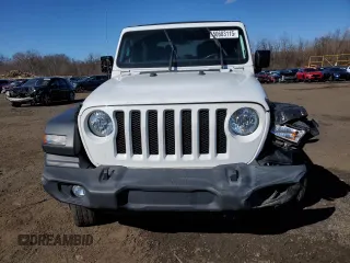 2021 Jeep Wrangler Sport S with VIN 1C4GJXANXMW751236, listed as a Copart auction lot 50683115 with 56,325 mi miles and Salvage Title. Bid and sale history available at DreamBid. Image 5.