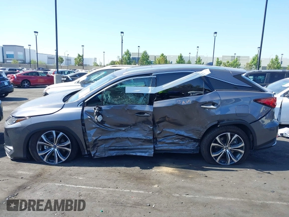 2022 Lexus RX 450h with VIN 2T2HGMDA4NC077617, listed as a IAAI auction lot 42489655 with 37,683 mi miles and . Bid and sale history available at DreamBid. Image 14.