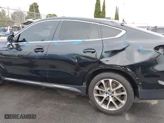 2021 BMW X6 xDrive40i with VIN 5UXCY6C08M9G88854, listed as a IAAI auction lot 41733568 with 30,150 mi miles. Bid and sale history available at carsss.com. Image 15.