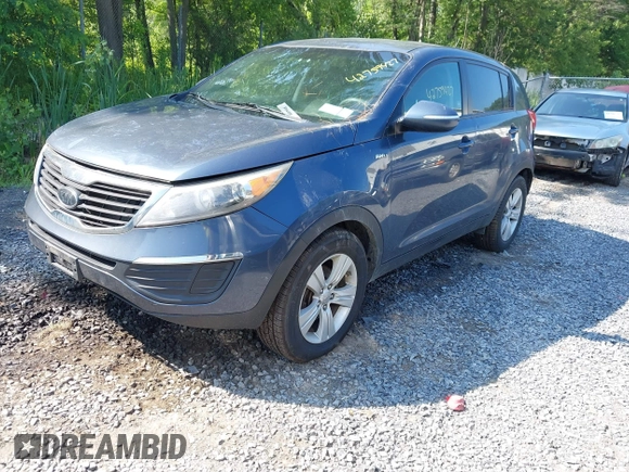 2012 Kia Sportage LX with VIN KNDPBCA28C7294317, listed as a IAAI auction lot 42759427 with 177,538 mi miles and . Bid and sale history available at DreamBid. Image 2.