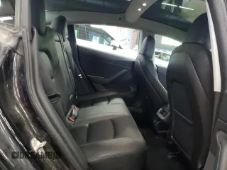 2018 Tesla Model 3 Long Range Battery z VIN 5YJ3E1EB4JF144295, wystawiony jako Copart lot #58754715 z przebiegiem 63 569 mil mil oraz Tytuł czysty. Historia ofert i sprzedaży dostępna na DreamBid. Obrazek 10.