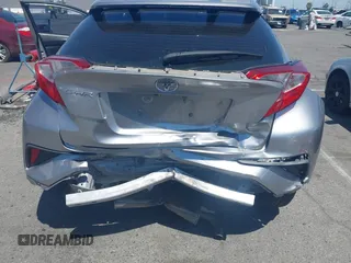 2018 Toyota C-HR XLE z VIN NMTKHMBX2JR057798, wystawiony jako IAAI lot #42327724 z przebiegiem 115 715 mil mil oraz . Historia ofert i sprzedaży dostępna na DreamBid. Obrazek 6.