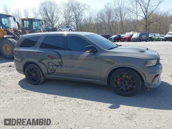 2021 Dodge Durango SRT Hellcat z VIN 1C4SDJH93MC683029, wystawiony jako IAAI lot #41875129 z przebiegiem 31 063 mil mil oraz . Historia ofert i sprzedaży dostępna na DreamBid. Obrazek 13.