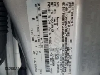 2013 Ford Focus SE z VIN 1FADP3F26DL217215, wystawiony jako Copart lot #46601875 z przebiegiem 167 160 mil mil oraz Szkoda całkowita • Salvage title. Historia ofert i sprzedaży dostępna na DreamBid. Obrazek 12.