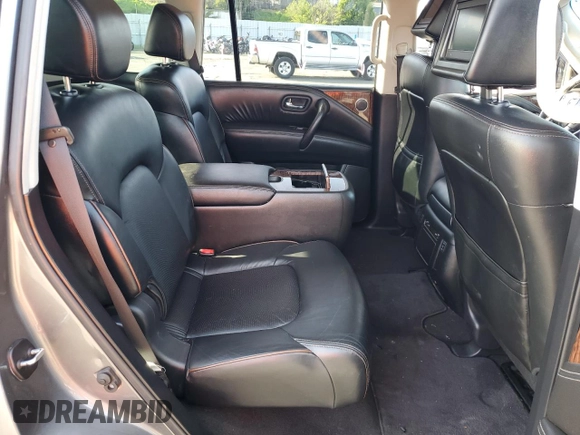 2017 Nissan Armada Platinum z VIN JN8AY2NF1H9300454, wystawiony jako Copart lot #49198605 z przebiegiem 109 546 mil mil oraz Szkoda całkowita • Salvage title. Historia ofert i sprzedaży dostępna na DreamBid. Obrazek 11.