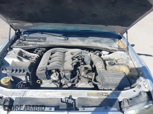 2005 Chrysler 300 z VIN 2C3AK53G25H653389, wystawiony jako IAAI lot #42482526 z przebiegiem 314 939 mil mil oraz . Historia ofert i sprzedaży dostępna na DreamBid. Obrazek 10.