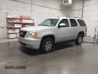 2011 GMC Yukon SLE with VIN 1GKS2AE01BR233860, listed as a IAAI auction lot 41838392 with 226,611 mi miles. Bid and sale history available at carsss.com. Image 2.