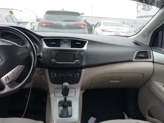 2015 Nissan Sentra S with VIN 3N1AB7AP4FY363387, listed as a IAAI auction lot 41862097 with 132,970 mi miles. Bid and sale history available at carsss.com. Image 17.