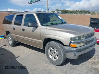 2005 Chevrolet Suburban LS z VIN 3GNEC16ZX5G195298, wystawiony jako IAAI lot #42130671 z przebiegiem 181 094 mil mil oraz . Historia ofert i sprzedaży dostępna na DreamBid. Obrazek 1.