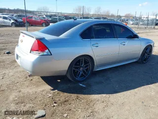 2014 Chevrolet Impala Limited LTZ with VIN 2G1WC5E33E1102480, listed as a IAAI auction lot 41666058 with NaN miles. Bid and sale history available at carsss.com. Image 4.