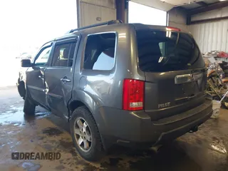2010 Honda Pilot Touring with VIN 5FNYF4H89AB026005, listed as a IAAI auction lot 42118607 with 182,689 mi miles. Bid and sale history available at carsss.com. Image 3.