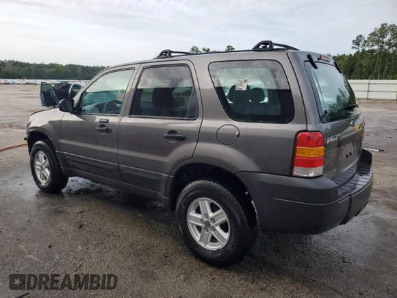 2006 Ford Escape XLS with VIN 1FMYU02Z66KA18952, listed as a Copart auction lot 60472305 with 221,258 mi miles and Salvage title. Bid and sale history available at DreamBid. Image 2.
