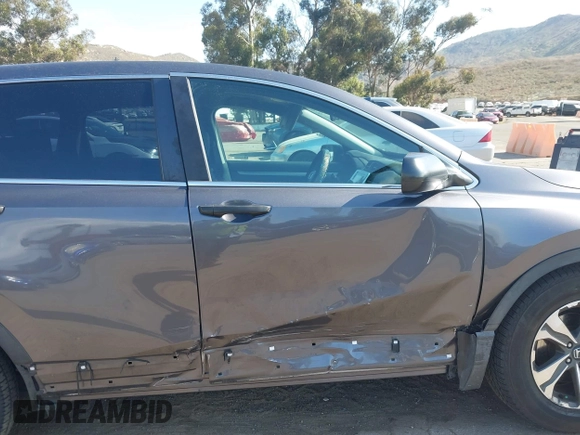 2019 Honda CR-V LX z VIN 2HKRW5H33KH401422, wystawiony jako IAAI lot #42116431 z przebiegiem 119 387 mil mil oraz . Historia ofert i sprzedaży dostępna na DreamBid. Obrazek 12.