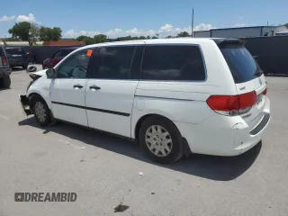2010 Honda Odyssey LX with VIN 5FNRL3H23AB032112, listed as a Copart auction lot 60876035 with 223,335 mi miles and Salvage title. Bid and sale history available at DreamBid. Image 2.
