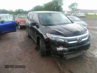2021 Honda Pilot EX-L with VIN 5FNYF5H50MB011165, listed as a IAAI auction lot 39799892 with 95,040 mi miles and . Bid and sale history available at carsss.com. Image 1.