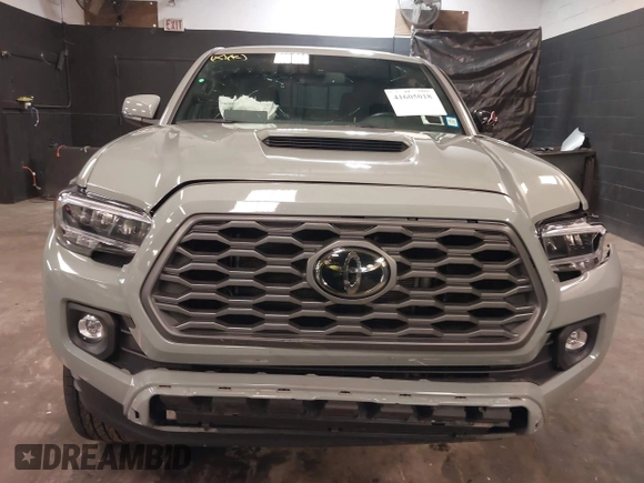 2023 Toyota Tacoma 4WD SR with VIN 3TMCZ5ANXPM607489, listed as a IAAI auction lot 41605018 with 15,229 mi miles. Bid and sale history available at carsss.com. Image 12.