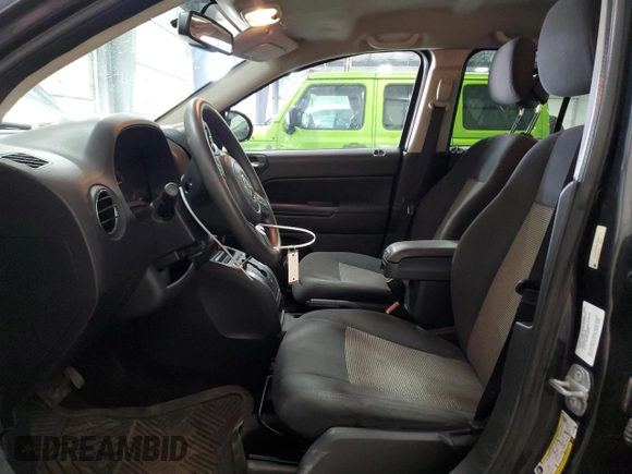2014 Jeep Compass Sport with VIN 1C4NJDBB3ED793061, listed as a Copart auction lot 50970625 with 146,113 mi miles and Salvage Title. Bid and sale history available at carsss.com. Image 7.