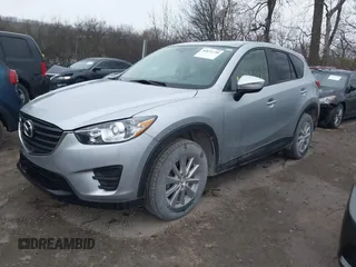 2016 Mazda CX-5 Sport with VIN JM3KE2BY5G0647715, listed as a IAAI auction lot 41831228 with 89,689 mi miles and . Bid and sale history available at DreamBid. Image 17.