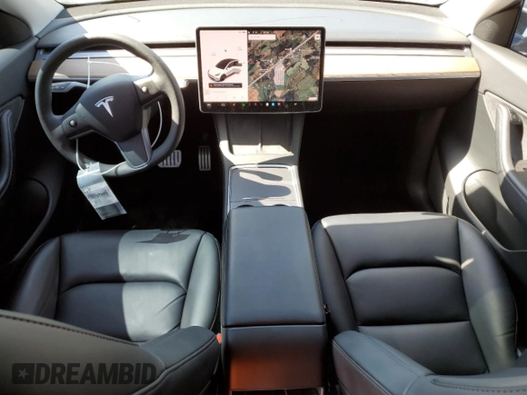 2021 Tesla Model Y Performance with VIN 5YJYGDEF7MF269221, listed as a Copart auction lot 52109785 with 61,619 mi miles and Salvage Title. Bid and sale history available at DreamBid. Image 8.