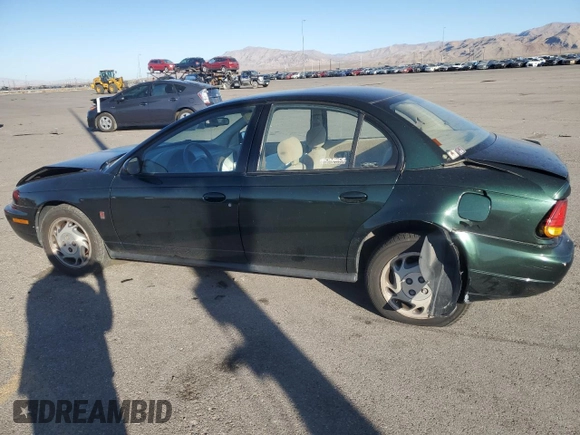 1996 Saturn SL with VIN 1G8ZK5272TZ137198, listed as a Copart auction lot 72446614 with 99,586 mi miles and Salvage title. Bid and sale history available at DreamBid. Image 2.