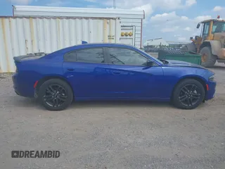 2019 Dodge Charger SXT with VIN 2C3CDXJG4KH550424, listed as a IAAI auction lot 40224159 with 56,988 mi miles and . Bid and sale history available at DreamBid. Image 13.