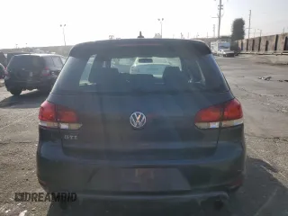 2010 Volkswagen GTI z VIN WVWGV7AJ6AW418495, wystawiony jako Copart lot #84345214 z przebiegiem 120 471 mil mil oraz Czysty tytuł • Clean title. Historia ofert i sprzedaży dostępna na DreamBid. Obrazek 6.