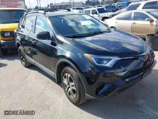 2018 Toyota RAV4 LE with VIN 2T3ZFREVXJW457751, listed as a IAAI auction lot 41529251 with 230,054 mi miles. Bid and sale history available at carsss.com. Image 1.