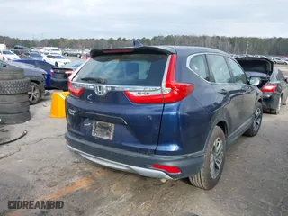 2019 Honda CR-V LX with VIN 2HKRW5H3XKH416533, listed as a IAAI auction lot 41623608 with 71,786 mi miles. Bid and sale history available at carsss.com. Image 4.