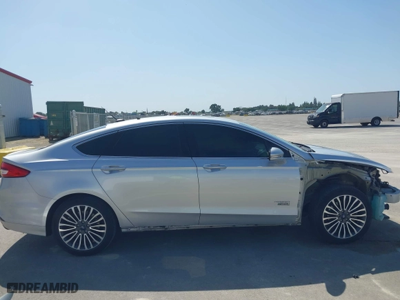 2017 Ford Fusion Energi SE with VIN 3FA6P0PU8HR242177, listed as a IAAI auction lot 42057898 with 119,435 mi miles. Bid and sale history available at carsss.com. Image 14.