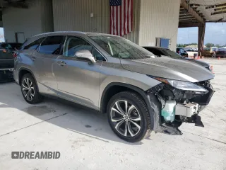 2020 Lexus RX 350L with VIN JTJHZKEA1L2015764, listed as a Copart auction lot 58324465 with 54,860 mi miles and Salvage title. Bid and sale history available at DreamBid. Image 4.