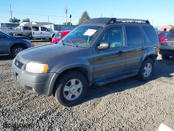 2003 Ford Escape XLT Popular 2 with VIN 1FMCU93143KB10936, listed as a IAAI auction lot 41414430 with 170,050 mi miles. Bid and sale history available at carsss.com. Image 2.