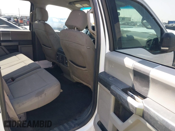 2018 Ford F-150 XL with VIN 1FTEW1EGXJKE70493, listed as a IAAI auction lot 42431141 with 106,786 mi miles and . Bid and sale history available at DreamBid. Image 8.