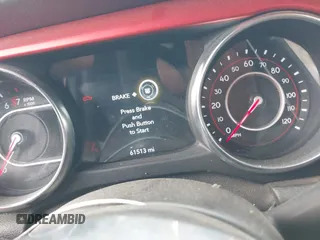 2021 Jeep Gladiator Rubicon with VIN 1C6JJTBG7ML554354, listed as a IAAI auction lot 41796943 with 61,513 mi miles and . Bid and sale history available at DreamBid. Image 7.