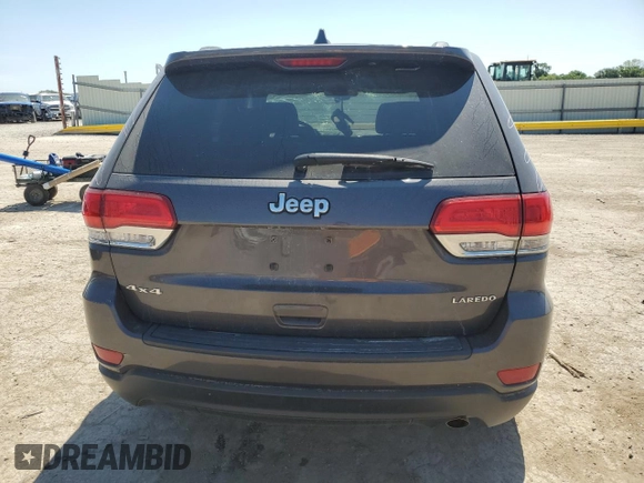 2016 Jeep Grand Cherokee Laredo with VIN 1C4RJFAG2GC328841, listed as a Copart auction lot 63553435 with 100,472 mi miles and Salvage title. Bid and sale history available at DreamBid. Image 6.