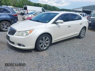 2013 Buick LaCrosse Premium 1 with VIN 1G4GF5E35DF318661, listed as a IAAI auction lot 42757734 with 259,103 mi miles and . Bid and sale history available at DreamBid. Image 2.