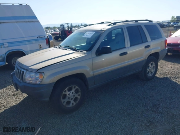 2001 Jeep Grand Cherokee Laredo with VIN 1J4GW48S11C519210, listed as a IAAI auction lot 42093631 with 211,024 mi miles. Bid and sale history available at carsss.com. Image 2.