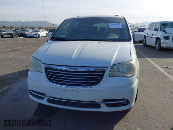 2012 Chrysler Town & Country Touring z VIN 2C4RC1BGXCR410507, wystawiony jako IAAI lot #41215704 z przebiegiem 161 501 mil mil oraz . Historia ofert i sprzedaży dostępna na DreamBid. Obrazek 6.
