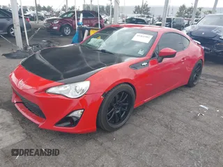 2016 Scion FR-S with VIN JF1ZNAA11G9709120, listed as a IAAI auction lot 41361502 with 74,281 mi miles. Bid and sale history available at carsss.com. Image 18.