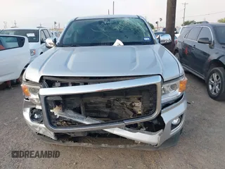 2018 GMC Canyon 2WD Denali z VIN 1GTG5EENXJ1256837, wystawiony jako IAAI lot #42139397 z przebiegiem 93 024 mil mil oraz . Historia ofert i sprzedaży dostępna na DreamBid. Obrazek 12.