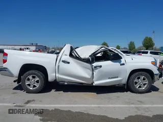 2014 Toyota Tundra 4WD Truck SR5 with VIN 5TFDW5F1XEX390763, listed as a IAAI auction lot 41973864 with 117,369 mi miles. Bid and sale history available at carsss.com. Image 13.