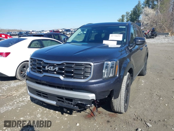 2025 Kia Telluride S with VIN 5XYP64GC4SG591192, listed as a IAAI auction lot 41758197 with 2,673 mi miles and . Bid and sale history available at DreamBid. Image 2.