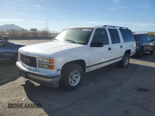 1999 GMC Suburban with VIN 3GKEC16R6XG538009, listed as a Copart auction lot 87112424 with 220,487 mi miles and Clean Title. Bid and sale history available at DreamBid. Image 1.