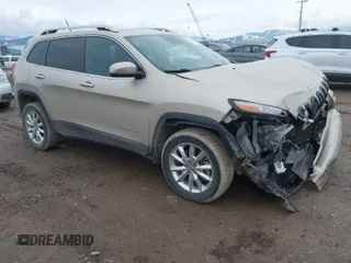 2014 Jeep Cherokee Limited with VIN 1C4PJMDS9EW308609, listed as a IAAI auction lot 41706124 with 84,005 mi miles. Bid and sale history available at carsss.com. Image 1.