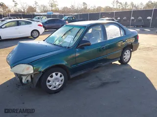 1999 Honda Civic VP with VIN 2HGEJ6614XH564053, listed as a IAAI auction lot 41317610 with 241,757 mi miles. Bid and sale history available at carsss.com. Image 18.