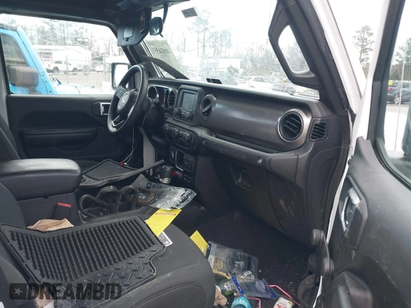 2021 Jeep Wrangler Sport S with VIN 1C4GJXAN6MW677281, listed as a IAAI auction lot 40814351 with 55,360 mi miles and . Bid and sale history available at DreamBid. Image 5.