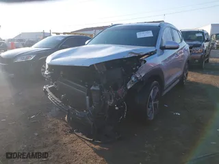 2018 Hyundai Tucson Value with VIN KM8J3CA23JU651464, listed as a IAAI auction lot 41757165 with 72,339 mi miles. Bid and sale history available at carsss.com. Image 6.