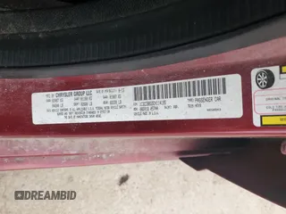 2014 Chrysler 200 Touring z VIN 1C3CCBBG5EN114195, wystawiony jako Copart lot #55720135 z przebiegiem 142 203 mil mil oraz Szkoda całkowita • Salvage title. Historia ofert i sprzedaży dostępna na DreamBid. Obrazek 12.