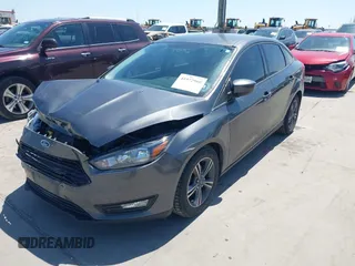 2018 Ford Focus SE with VIN 1FADP3FE3JL204220, listed as a IAAI auction lot 41972960 with 62,682 mi miles and . Bid and sale history available at DreamBid. Image 2.